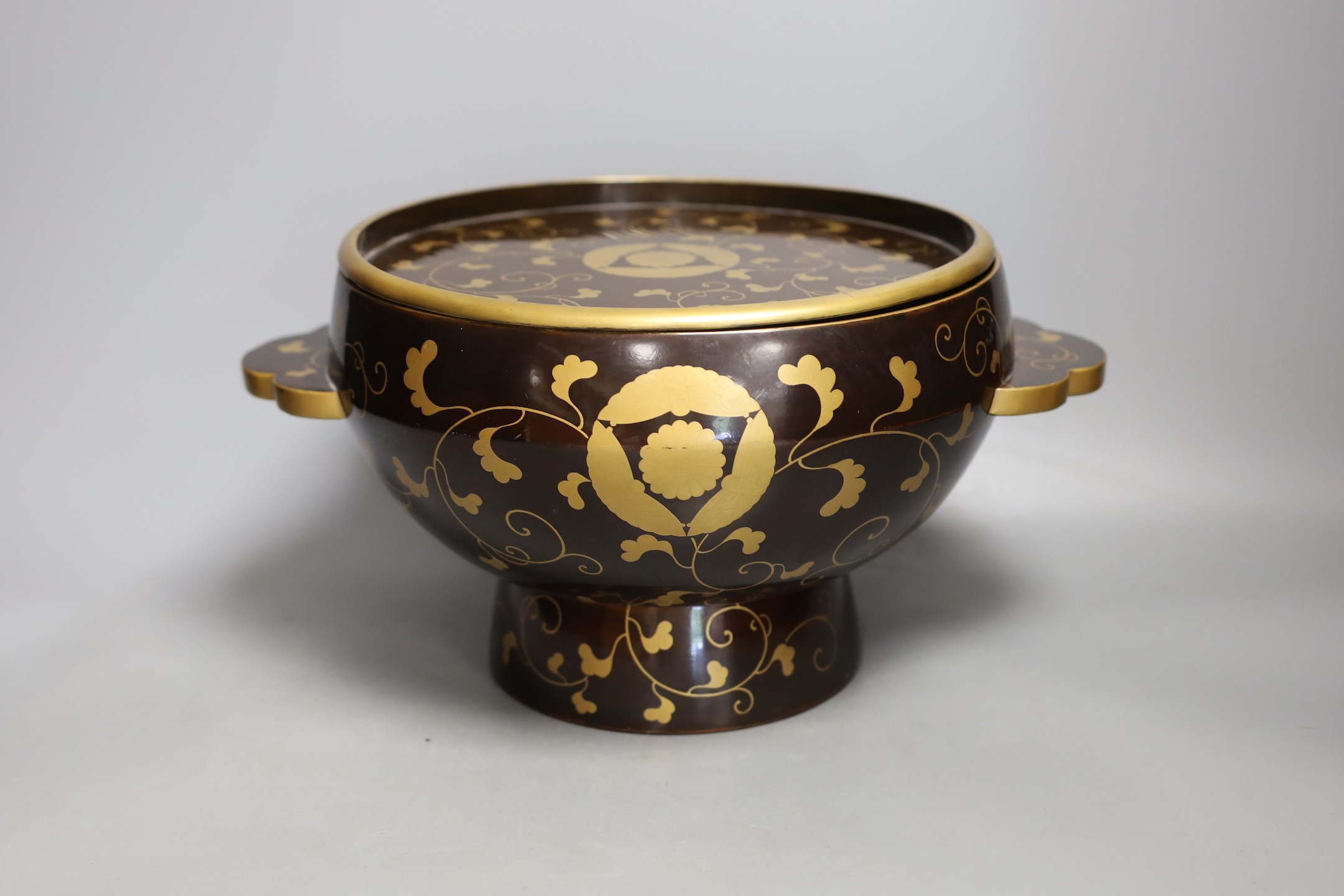 An early 20th century Japanese gilt decorated lacquer bowl and cover